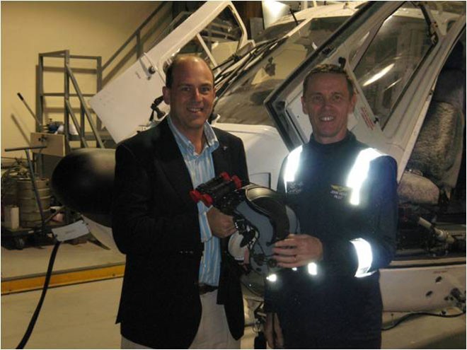 CYCA Commodore and SOLAS Chairman Matt Allen handing over 1 of 3 Night Vision Goggles donated by SOLAS to NRMA Care Flight in 2008 © CYCA . http://www.cyca.com.au